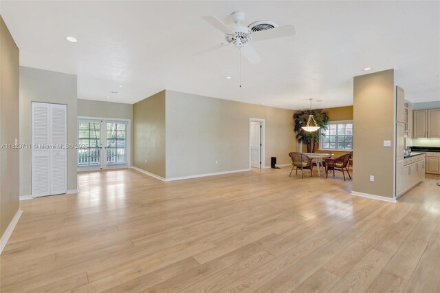 20406 SW 54th Pl, Pembroke Pines, FL 33332 - living room with light wood-style flooring, ceiling fan, and recessed lighting