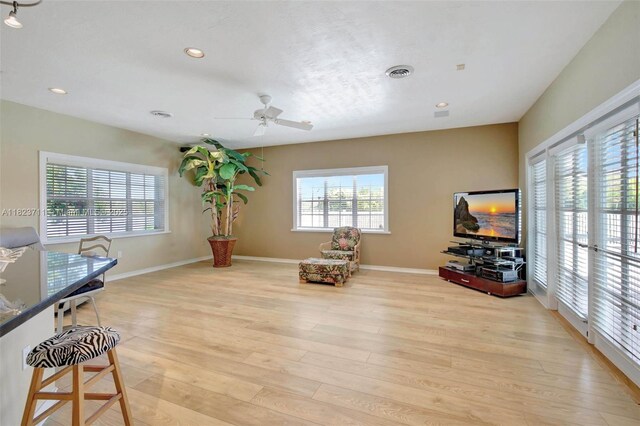 20406 SW 54th Pl, Pembroke Pines, FL 33332 - living area with healthy amount of natural light, light wood-style flooring, a ceiling fan, and recessed lighting