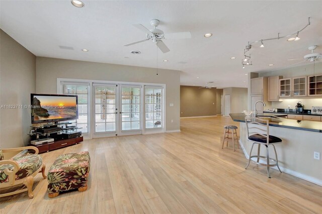 20406 SW 54th Pl, Pembroke Pines, FL 33332 - living area with a ceiling fan, light wood-style floors, and recessed lighting
