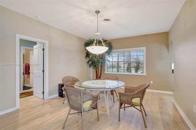 20406 SW 54th Pl, Pembroke Pines, FL 33332 - dining space with light wood finished floors and arched walkways
