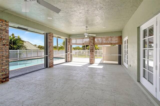 20406 SW 54th Pl, Pembroke Pines, FL 33332 - unfurnished sunroom featuring a ceiling fan