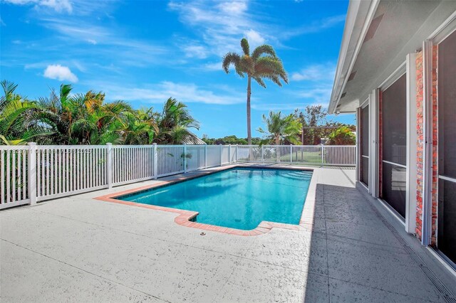 20406 SW 54th Pl, Pembroke Pines, FL 33332 - view of swimming pool with a patio