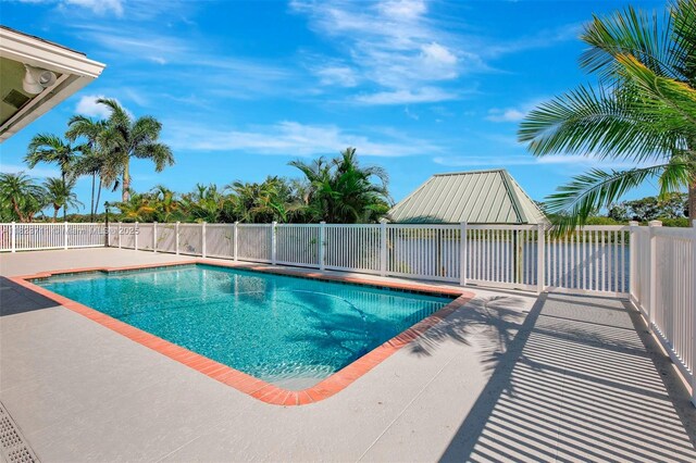 20406 SW 54th Pl, Pembroke Pines, FL 33332 - view of swimming pool with a patio area