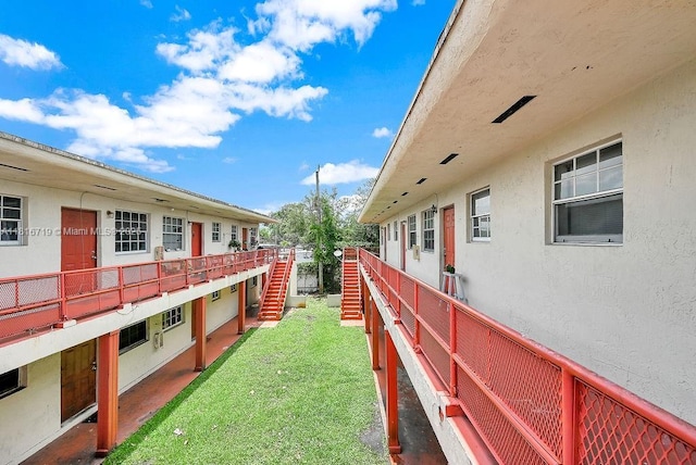 14180 NW 22nd Ave Unit 4, Opa-Locka, FL 33054 - view of green lawn with stairs
