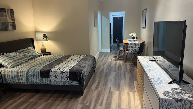 8132 Harding Ave Unit 2, Miami Beach, FL 33141 - bedroom with wood finished floors and baseboards
