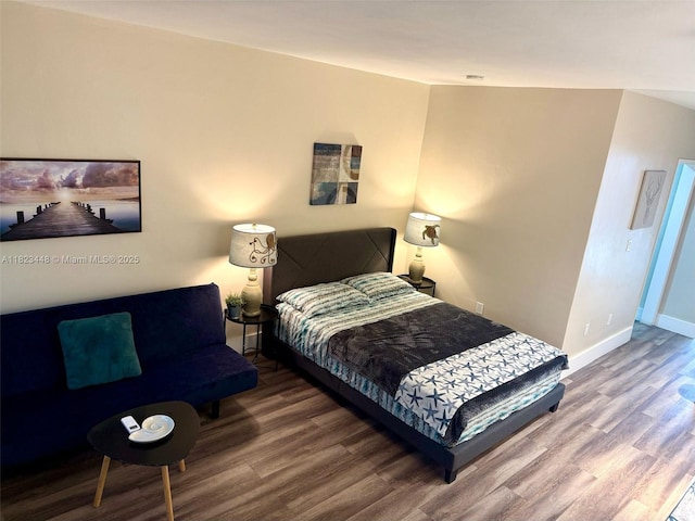 8132 Harding Ave Unit 2, Miami Beach, FL 33141 - bedroom with wood finished floors and baseboards