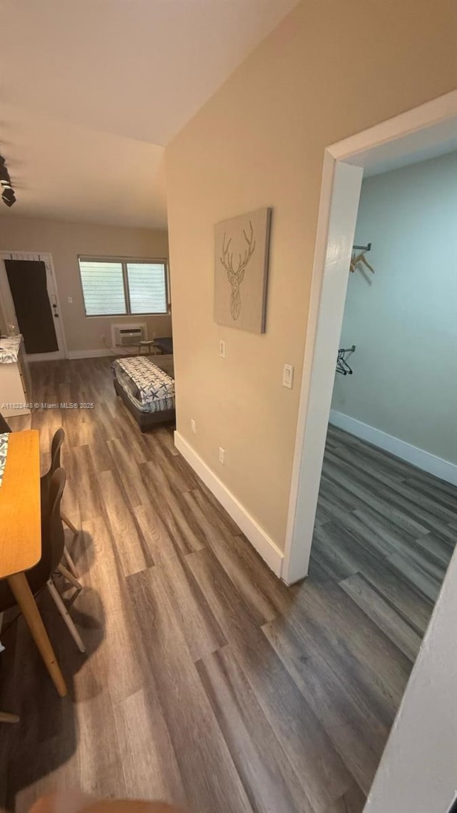8132 Harding Ave Unit 2, Miami Beach, FL 33141 - corridor featuring wood finished floors and baseboards
