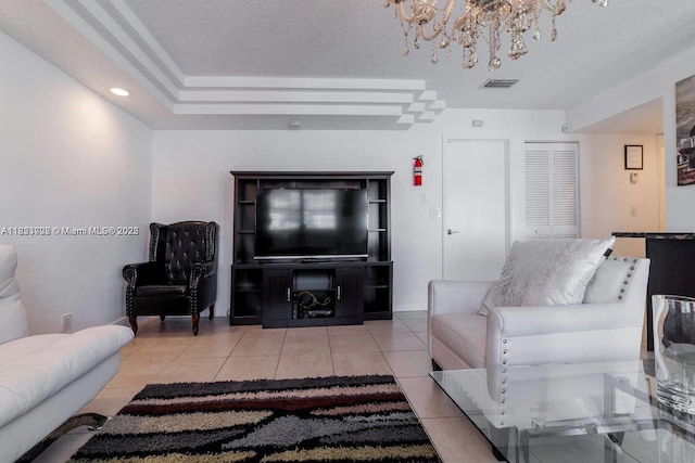 203 SE 8th St, Dania Beach, FL 33004 - living area with a chandelier, tile patterned floors, a textured ceiling, and recessed lighting