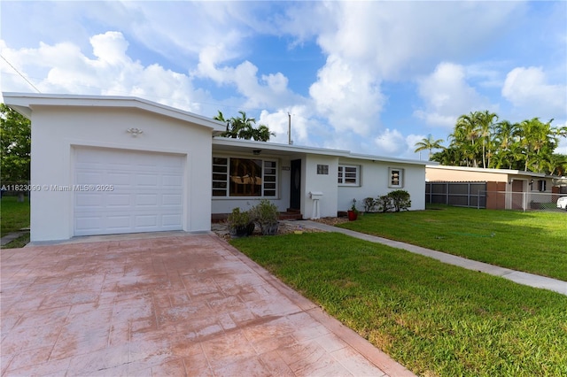 9351 SW 53rd St, Miami, FL 33165 - ranch-style house with stucco siding, a garage, and decorative driveway