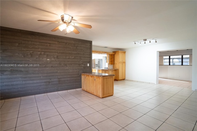 9351 SW 53rd St, Miami, FL 33165 - kitchen with stainless steel fridge with ice dispenser, a peninsula, ceiling fan, light tile patterned floors, and light brown cabinets