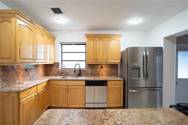 9351 SW 53rd St, Miami, FL 33165 - kitchen featuring stainless steel appliances, decorative backsplash, and light stone countertops