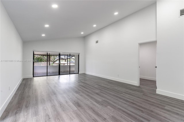 272 Fairway Cir Unit 98, Weston, FL 33326 - unfurnished room with recessed lighting, high vaulted ceiling, and wood finished floors