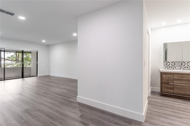 272 Fairway Cir Unit 98, Weston, FL 33326 - spare room featuring wood finished floors and recessed lighting