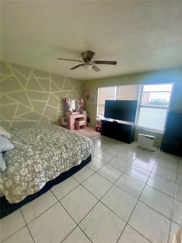 1160 NE 191st St Unit 32, Miami, FL 33179 - bedroom with light tile patterned floors and a ceiling fan