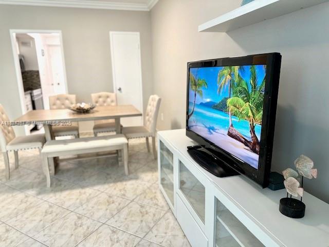 3505 S Ocean Dr Unit 419, Hollywood, FL 33019 - dining space with ornamental molding