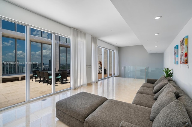 495 Brickell Unit 5705, Miami, FL 33131 - tiled living room featuring recessed lighting