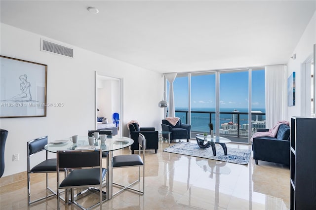 495 Brickell Unit 5705, Miami, FL 33131 - dining space with a water view and floor to ceiling windows
