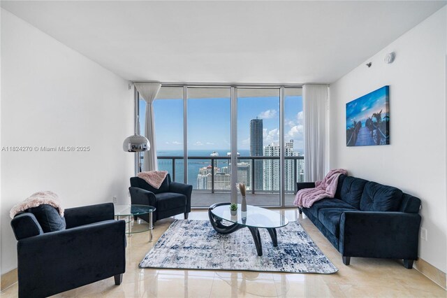 495 Brickell Unit 5705, Miami, FL 33131 - living room featuring a wall of windows and tile patterned flooring