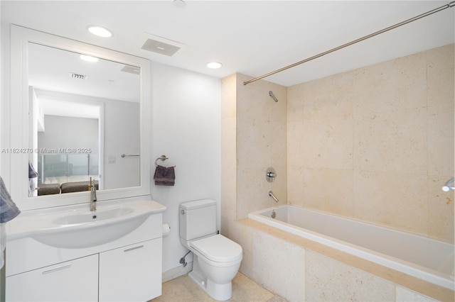 495 Brickell Unit 5705, Miami, FL 33131 - bathroom featuring vanity, tiled shower / bath, and recessed lighting