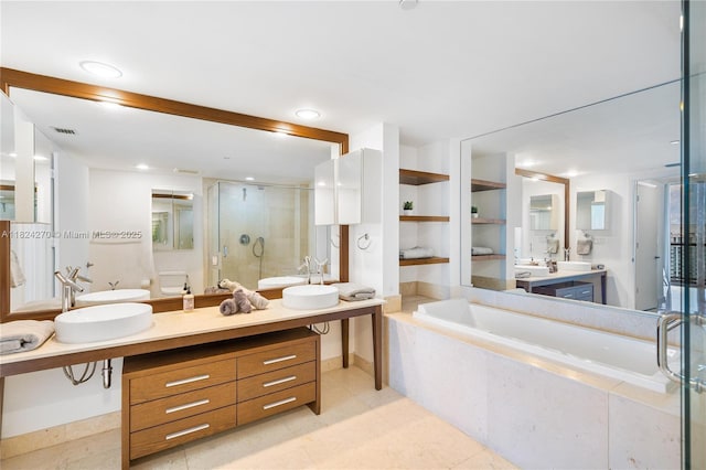 495 Brickell Unit 5705, Miami, FL 33131 - full bathroom with a garden tub, a stall shower, and double vanity