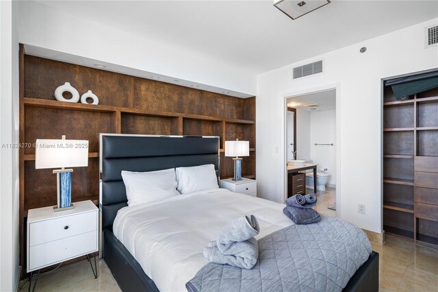 495 Brickell Unit 5705, Miami, FL 33131 - bedroom featuring ensuite bath
