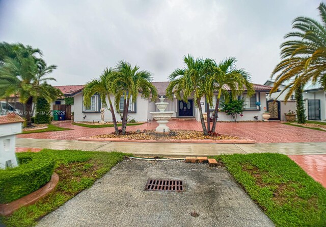 14332 SW 38th Ter, Miami, FL 33175 - view of front of house featuring stucco siding