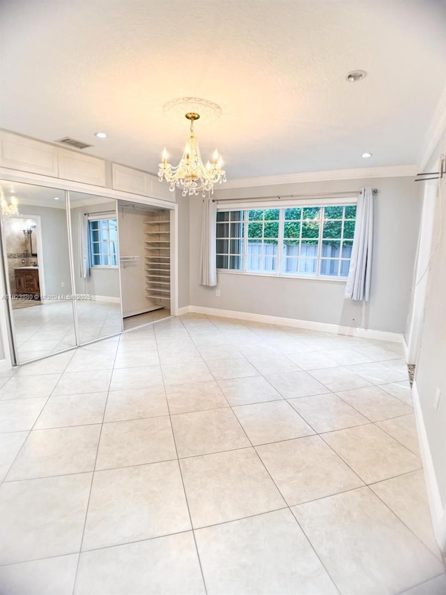 14332 SW 38th Ter, Miami, FL 33175 - unfurnished room featuring a chandelier, light tile patterned flooring, recessed lighting, and crown molding