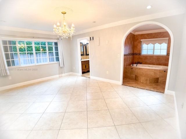 14332 SW 38th Ter, Miami, FL 33175 - unfurnished room featuring crown molding, a chandelier, tile patterned floors, and arched walkways