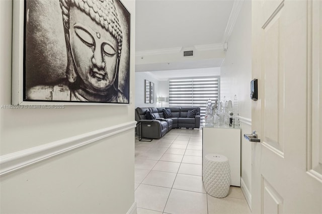 2425 SW 27th Ave Unit 705, Miami, FL 33145 - hall featuring crown molding and light tile patterned floors