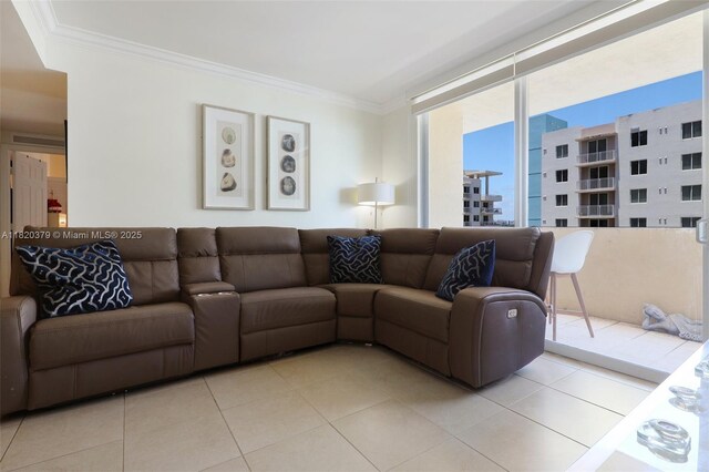 2425 SW 27th Ave Unit 705, Miami, FL 33145 - living area with ornamental molding and light tile patterned flooring