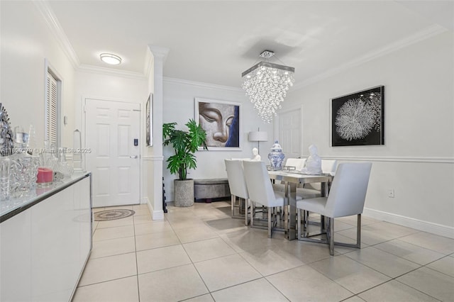 2425 SW 27th Ave Unit 705, Miami, FL 33145 - dining room featuring ornamental molding, light tile patterned flooring, and a chandelier