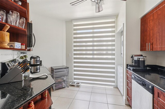 2425 SW 27th Ave Unit 705, Miami, FL 33145 - kitchen featuring appliances with stainless steel finishes, light tile patterned flooring, dark stone counters, and open shelves