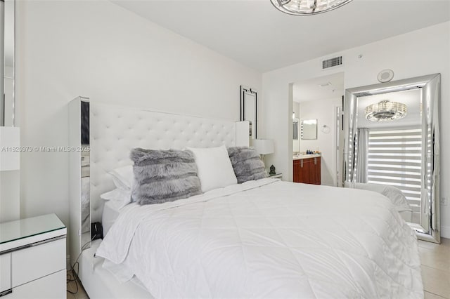 2425 SW 27th Ave Unit 705, Miami, FL 33145 - tiled bedroom with connected bathroom