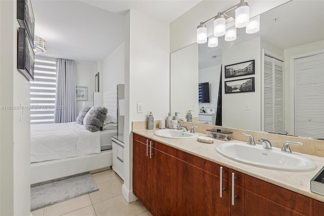 2425 SW 27th Ave Unit 705, Miami, FL 33145 - full bathroom featuring tile patterned flooring, double vanity, and a closet