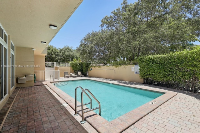 2425 SW 27th Ave Unit 705, Miami, FL 33145 - community pool with a patio