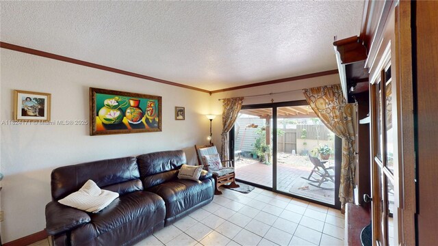 1000 SW 136th Pl, Miami, FL 33184 - living area featuring a textured ceiling, ornamental molding, and light tile patterned floors