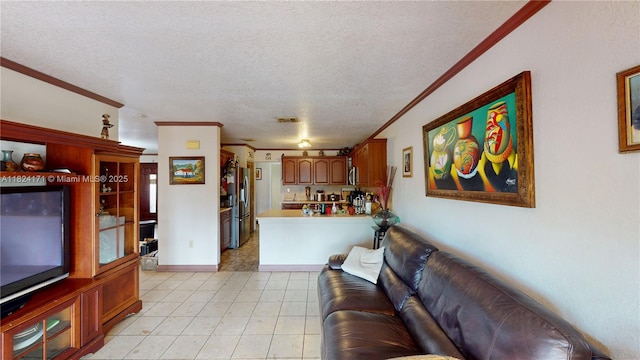 1000 SW 136th Pl, Miami, FL 33184 - living room featuring crown molding, a textured ceiling, and light tile patterned floors