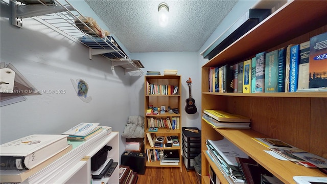 1000 SW 136th Pl, Miami, FL 33184 - office area featuring a textured ceiling and wood finished floors