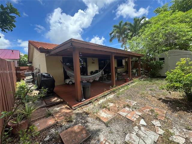 1000 SW 136th Pl, Miami, FL 33184 - view of patio / terrace with a storage shed and area for grilling