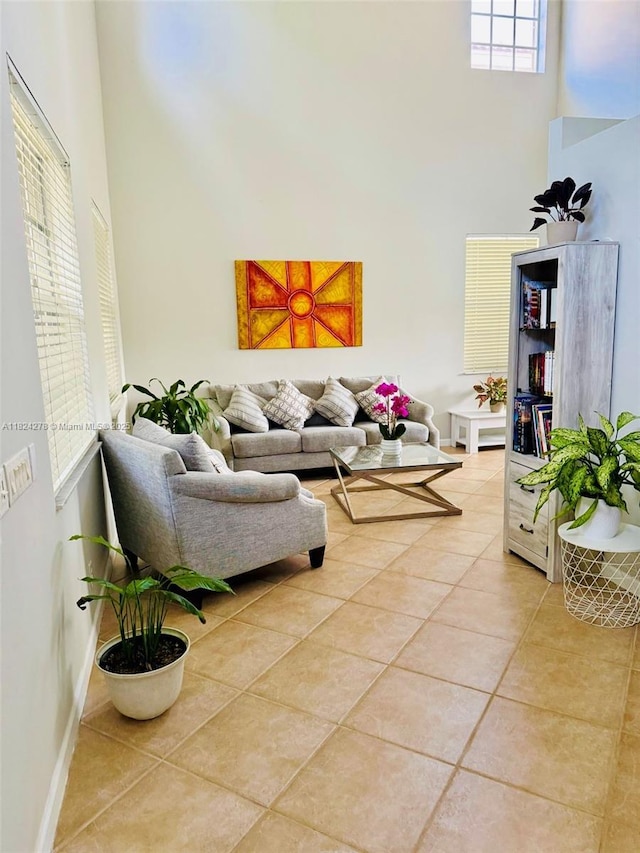 1325 Chenille Cir, Weston, FL 33327 - living area with a high ceiling and light tile patterned flooring