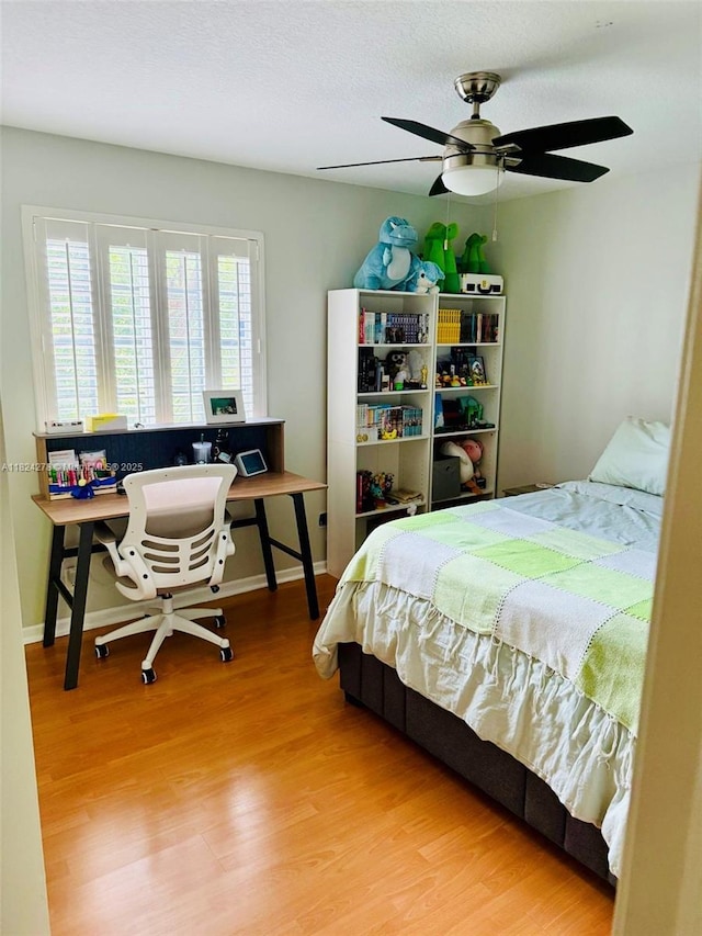 1325 Chenille Cir, Weston, FL 33327 - bedroom featuring wood finished floors and a ceiling fan