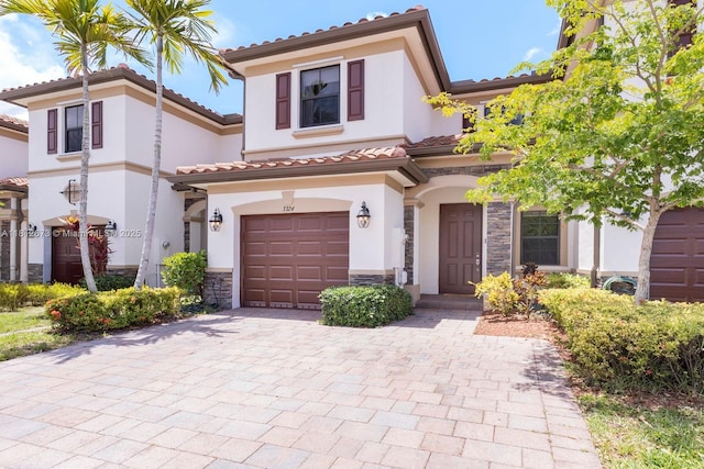 3324 W 90, Hialeah, FL 33018 - view of front of property featuring stone siding, a garage, stucco siding, and a tiled roof