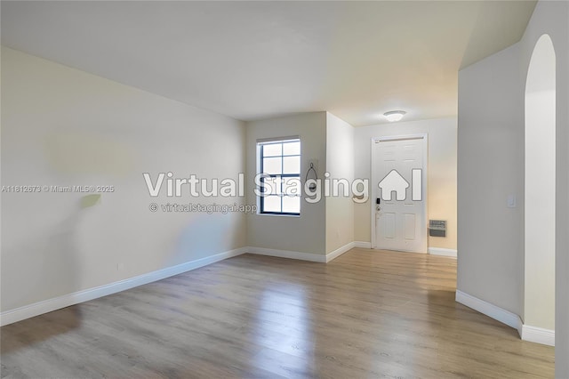 3324 W 90, Hialeah, FL 33018 - foyer entrance with arched walkways and wood finished floors