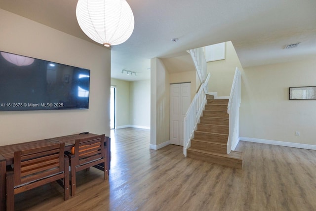 3324 W 90, Hialeah, FL 33018 - living room featuring wood finished floors and stairs