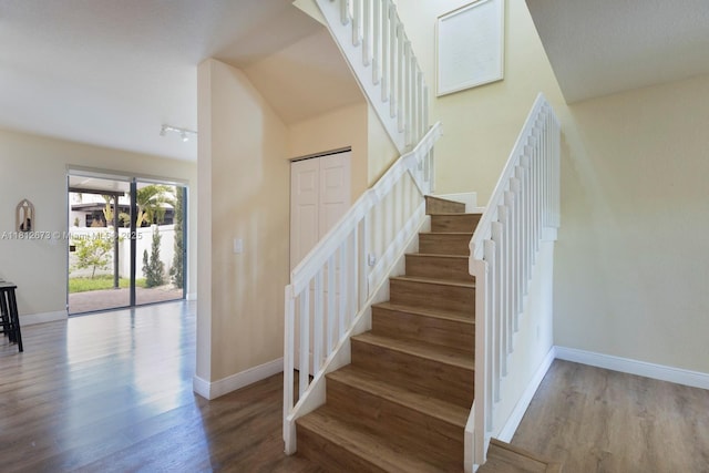 3324 W 90, Hialeah, FL 33018 - staircase featuring wood finished floors and vaulted ceiling