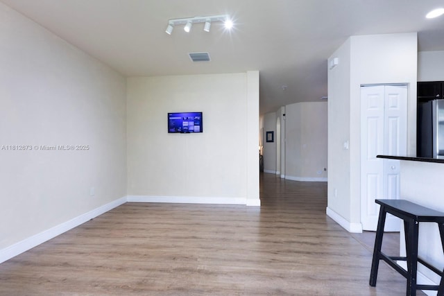 3324 W 90, Hialeah, FL 33018 - empty room featuring wood finished floors and arched walkways