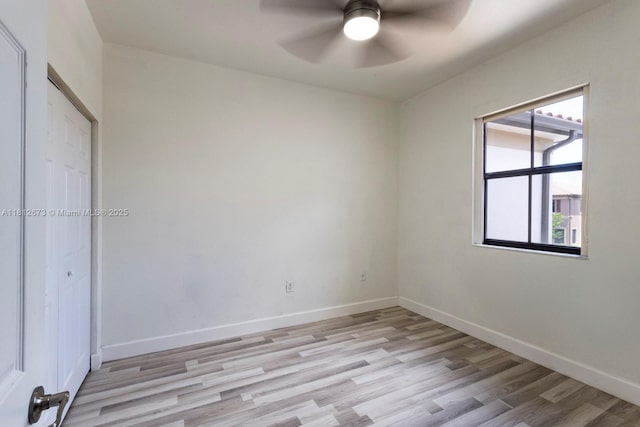 3324 W 90, Hialeah, FL 33018 - unfurnished bedroom with light wood finished floors and a ceiling fan