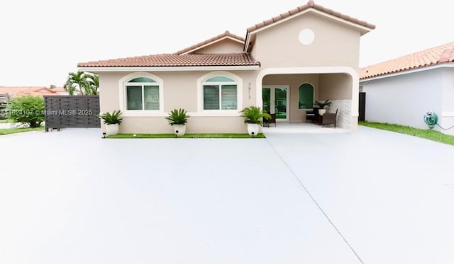 3813 SW 149th Pl, Miami, FL 33185 - mediterranean / spanish-style house with a tiled roof and stucco siding