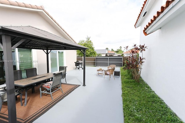 3813 SW 149th Pl, Miami, FL 33185 - view of patio with a gazebo and outdoor dining space