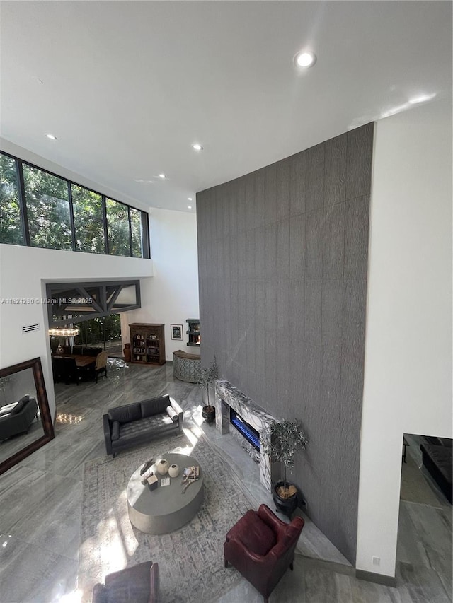 5811 SW 33rd Ter, Hollywood, FL 33312 - living room featuring recessed lighting and a high ceiling